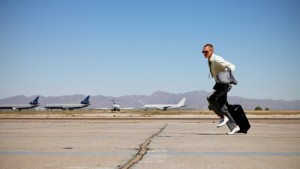 man running at airport